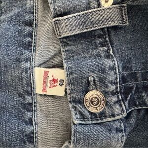 Relaxed Blue Jeans with Vintage Look and Distressed Texture